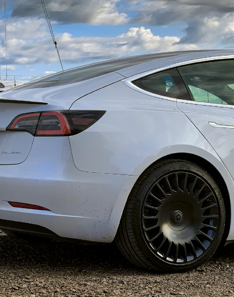  Wheelsboy Select TNA Wheels in Onyx Black are custom-engineered for Tesla vehicles. Featuring a sleek, bold finish and performance-optimized design, they deliver head-turning aesthetics and enhanced efficiency, making them the perfect upgrade for Tesla owners.